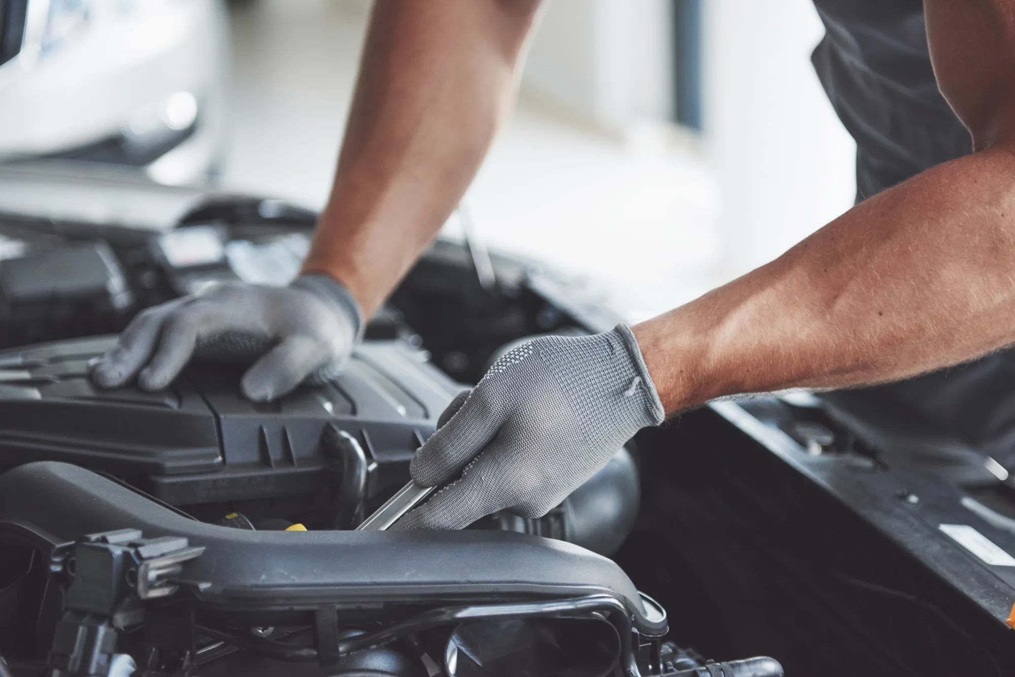 Auto mechanic working garage repair service